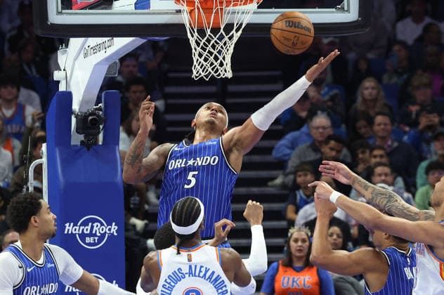 March 17, 2026, Orlando, Fl - Florida, USA: The Orlando Magic s Paolo Banchero (5) reaches for a rebound against the Oklahoma City Thunder at the Kia Center on Tuesday, March 17, 2026, in Orlando, Florida. Orlando USA - ZUMAm67_ 20260317_zaf_m67_023 Copyright: xStephenxM.xDowellx