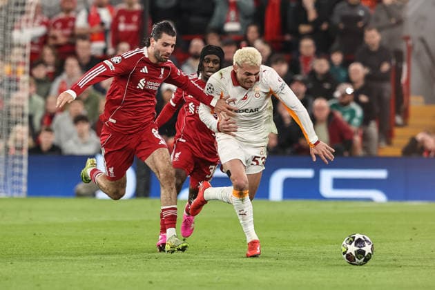 UEFA Champions League last 16 second leg match Liverpool v Galatasaray BarÄ±s Alper YÄ±lmaz of Galatasaray holds back Dominik Szoboszlai of Liverpool as he breaks with the ball during the UEFA Champions League last 16 second leg match Liverpool vs Galatasaray at Anfield, Liverpool, United Kingdom on 18 March 2026 (Photo by Alfie Cosgrove News Images) Liverpool Anfield Merseyside United Kingdom Copyright: xAlfiexCosgrove NewsxImagesx