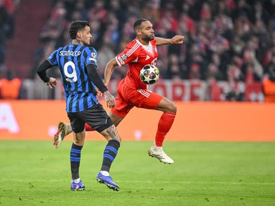 Gianluca Scamacca (Atalanta BC) and Jonathan Tah (FC Bayern München) battle for the ball during the UEFA Champions League 2025 26 Round of 16 Second Leg match between FC Bayern München and Atalanta BC at Football Arena Munich on March 18, 2026 in Munich, Germany. (Photo by Harry Langer DeFodi Images) -