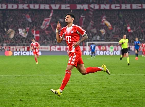 18.03.2026, Fussball UEFA Championsleague 2025 2026: Achtelfinale Rückspiel, FC Bayern München - Atalanta Bergamo, in der Allianz-Arena München, Luis Diaz (FC Bayern München) jubelt.