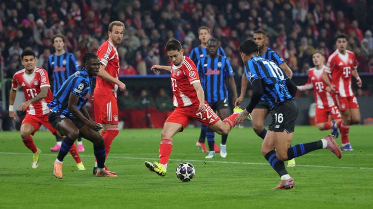 (260319) -- MUNICH, March 19, 2026 -- Bayern Munich s Raphael Guerreiro (C) shoots during the UEFA Champions League Round of 16 second leg match between Bayern Munich and Atalanta in Munich, Germany, March 18, 2026. (Photo by Xinhua) (SP)GERMANY-MUNICH-FOOTBALL-UEFA CHAMPIONS LEAGUE-BAYERN MUNICH VS ATALANTA PhilippexRuiz 
