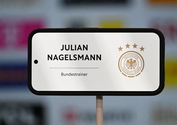 19.03.2026, xsltx, Fussball DFB-Medientermine, DFB Pressekonferenz - Kaderbekanntgabe v.l. Namensschild Julian Nagelsmann (Bundestrainer Deutsche Nationalmannschaft) (DFL DFB REGULATIONS PROHIBIT ANY USE OF PHOTOGRAPHS as IMAGE SEQUENCES and or QUASI-VIDEO)