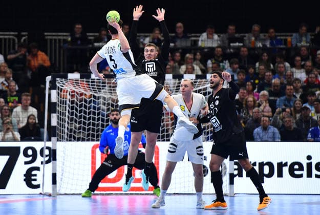 Handball Länderspiel: Deutschland - Ägypten am 19.03.20226 in der Westfalenhalle in Dortmund v.l.n.r.: Miro Schluroff ( Deutschland ), Hesham Salah ( Ägypten ), Justus Fischer ( Deutschland ), Mahmoud Abdelaziz ( Ägypten ) Nordrhein-Westfalen Deutschland