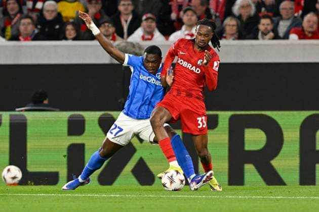 Freiburg v KRC Genk - UEFA Europa League FREIBURG, GERMANY - MARCH 19 : Nkuba Ken defender of KRC Genk and Jordy Makengo defender of Freiburg during the UEFA Europa League 2025 26 round of 16 match second leg between Freiburg and KRC Genk on March 19, 2026 in Freiburg, Germany, 19 03 2026 Freiburg Germany  Copyright: xDhax