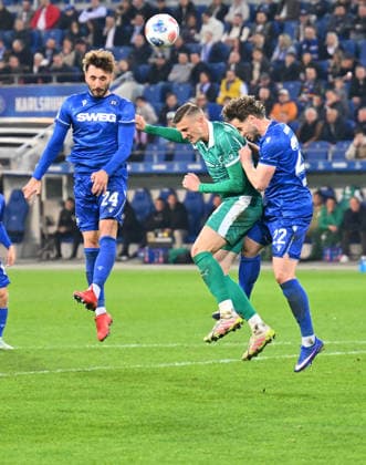 20.03.2026 - Fussball - Saison 2025 2026 - 2. Fussball - Bundesliga - 27. Spieltag: Karlsruher SC KSC Karlsruhe - SpVgg Greuther Fürth SGF ( Kleeblatt ) - Sportfoto Zink - xwoxzix - DFL regulations prohibit any use of photographs as image sequences and or quasi-video - only for editorial use - Fabian Schleusener (24, Karlsruher SC KSC ) Philipp Ziereis (4, SpVgg Greuther Fürth ) Christoph Kobald (22, Karlsruher SC KSC )