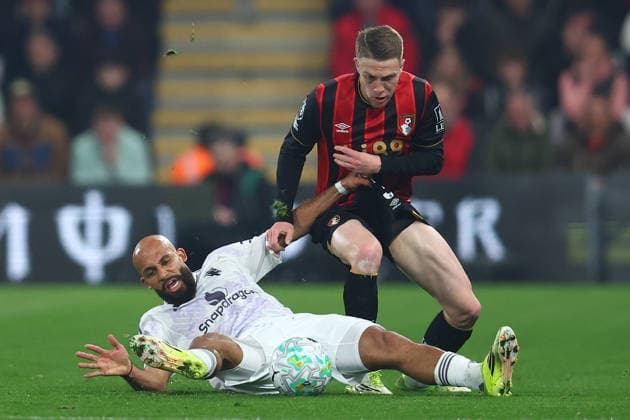 Bournemouth, England, 20th March 2026. Bryan Mbeumo of Manchester United, ManU and Adrien Truffert of Bournemouth challenge for the ball during the AFC Bournemouth vs Manchester United Premier League match at the Vitality Stadium, Bournemouth. Picture credit should read: Paul Terry Sportimage EDITORIAL USE ONLY. No use with unauthorised audio, video, data, fixture lists, club league logos or live services. Online in-match use limited to 120 images, no video emulation. No use in betting, games or single club league player publications. SPI_015_PT_Bournemouth_Man_Utd SPI-4628-0015