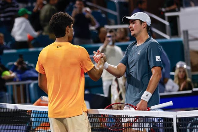 MIAMI GARDENS, FL - MARCH 20: Carlos Alcaraz (ESP) shakes hands at the end of a men™s singles match with Joao Fonseca (BRA) at the Miami Open on March 20, 2026, at Hard Rock Stadium in Miami Gardens, Florida,(Photo by Chris Arjoon Icon Sportswire) TENNIS: MAR 20 Miami Open EDITORIAL USE ONLY Icon2603200010222