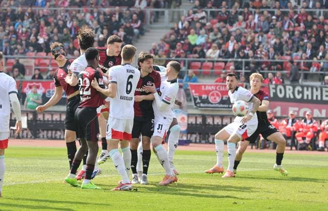 21.03.2026 - Fussball - Saison 2025 2026 - 2. Fussball - Bundesliga - 27. Spieltag: 1. FC Nürnberg FCN ( Club ) - 1. FC Kaiserslautern FCK ( Rote Roten Teufel ) - Sportfoto Zink DaMa - xdaxmax - DFL regulations prohibit any use of photographs as image sequences and or quasi-video - only for editorial use - Tor Treffer Torschuß zum 1:0 - Torschütze Luka Lochoshvili (24, 1. FC Nürnberg FCN ) per Kopfball