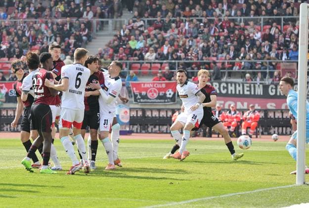 21.03.2026 - Fussball - Saison 2025 2026 - 2. Fussball - Bundesliga - 27. Spieltag: 1. FC Nürnberg FCN ( Club ) - 1. FC Kaiserslautern FCK ( Rote Roten Teufel ) - Sportfoto Zink DaMa - xdaxmax - DFL regulations prohibit any use of photographs as image sequences and or quasi-video - only for editorial use - Tor Treffer Torschuß zum 1:0 - Torschütze Luka Lochoshvili (24, 1. FC Nürnberg FCN ) per Kopfball gg Julian Krahl (1, 1. FC Kaiserslautern FCK )