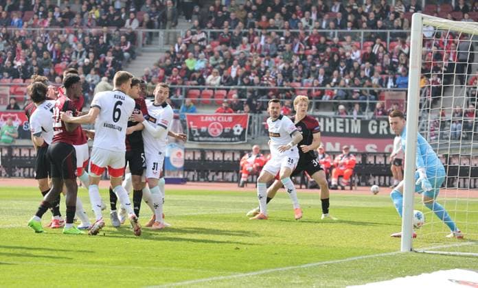 21.03.2026 - Fussball - Saison 2025 2026 - 2. Fussball - Bundesliga - 27. Spieltag: 1. FC Nürnberg FCN ( Club ) - 1. FC Kaiserslautern FCK ( Rote Roten Teufel ) - Sportfoto Zink DaMa - xdaxmax - DFL regulations prohibit any use of photographs as image sequences and or quasi-video - only for editorial use - Tor Treffer Torschuß zum 1:0 - Torschütze Luka Lochoshvili (24, 1. FC Nürnberg FCN ) per Kopfball gg Julian Krahl (1, 1. FC Kaiserslautern FCK )