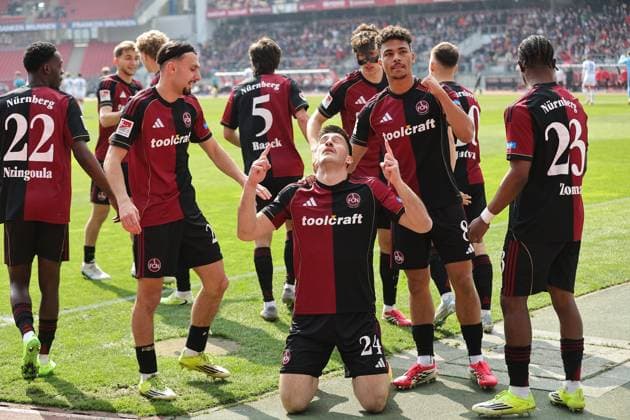 21.03.2026 - Fussball - Saison 2025 2026 - 2. Fussball - Bundesliga - 27. Spieltag: 1. FC Nürnberg FCN ( Club ) - 1. FC Kaiserslautern FCK ( Rote Roten Teufel ) - Sportfoto Zink DaMa - xdaxmax - DFL regulations prohibit any use of photographs as image sequences and or quasi-video - only for editorial use - Jubel Freude Torjubel nach Tor zum 1:0 - Luka Lochoshvili (24, 1. FC Nürnberg FCN ) und Mannschaft Team jubelt freut sich - Torschütze: Luka Lochoshvili (24, 1. FC Nürnberg FCN ) *** 21 03 2026 Soccer Season 2025 2026 2 Soccer Bundesliga 27 Matchday 1 FC Nürnberg FCN Club 1 FC Kaiserslautern FCK Rote Roten Teufel Sportfoto Zink DaMa xdaxmax DFL regulations prohibit any use of photographs as image sequences and or quasi video only for editorial use Jubel Freude Torjubel nach Tor zum 1 0 Luka Lochoshvili 24, 1 FC Nürnberg FCN und Mannschaft Team jubelt freut sich Torschütze Luka Lochoshvili 24, 1 FC Nürnberg FCN