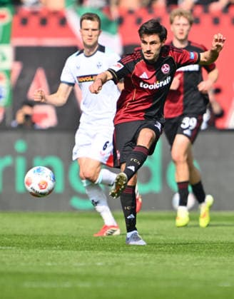 21.03.2026 - Fussball - Saison 2025 2026 - 2. Fussball - Bundesliga - 27. Spieltag: 1. FC Nürnberg FCN ( Club ) - 1. FC Kaiserslautern FCK ( Rote Roten Teufel ) - Sportfoto Zink - xwoxzix - DFL regulations prohibit any use of photographs as image sequences and or quasi-video - only for editorial use - Tom Baack (5, 1. FC Nürnberg FCN ) Freisteller Einzelbild