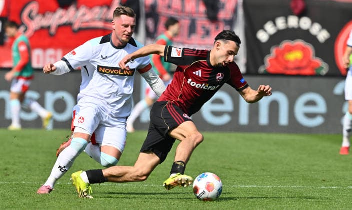 21.03.2026 - Fussball - Saison 2025 2026 - 2. Fussball - Bundesliga - 27. Spieltag: 1. FC Nürnberg FCN ( Club ) - 1. FC Kaiserslautern FCK ( Rote Roten Teufel ) - Sportfoto Zink - xwoxzix - DFL regulations prohibit any use of photographs as image sequences and or quasi-video - only for editorial use - Marlon Ritter (7, 1. FC Kaiserslautern FCK ) Berkay Yilmaz (21, 1. FC Nürnberg FCN )