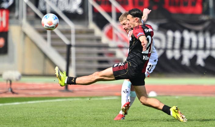 21.03.2026 - Fussball - Saison 2025 2026 - 2. Fussball - Bundesliga - 27. Spieltag: 1. FC Nürnberg FCN ( Club ) - 1. FC Kaiserslautern FCK ( Rote Roten Teufel ) - Sportfoto Zink - xwoxzix - DFL regulations prohibit any use of photographs as image sequences and or quasi-video - only for editorial use - Berkay Yilmaz (21, 1. FC Nürnberg FCN ) Paul Joly (26, 1. FC Kaiserslautern FCK )
