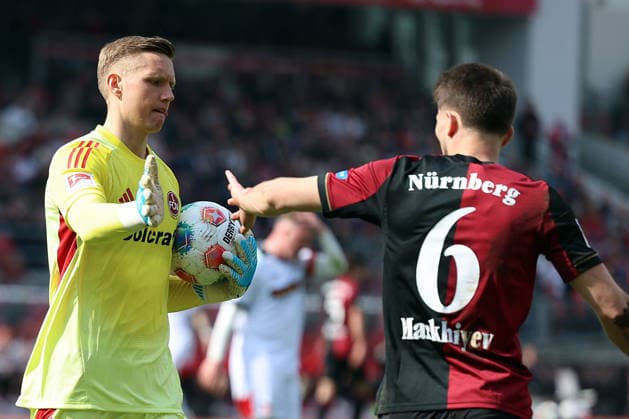 21.03.2026, xrekx, Fussball 2.Bundesliga, 1. FC Nuernberg - 1.FC Kaiserslautern v.l. Jan Reichert (1.FC Nuernberg) Adam Markhiev (1.FC Nuernberg) lacht, laechelt, positiv, zufrieden, laughs, smiles, positive, satisfied (DFL DFB REGULATIONS PROHIBIT ANY USE OF PHOTOGRAPHS as IMAGE SEQUENCES and or QUASI-VIDEO) Nuernberg