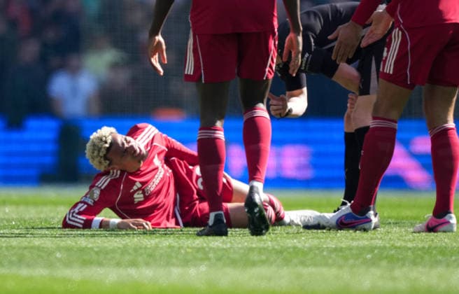 Brighton and Hove Albion v Liverpool, Premier League, Football, Amex Stadium, Brighton, UK - 21 Mar 2026 Hugo Ekitike of Liverpool goes down injured. Brighton Amex Stadium Brighton UK, UK NEWSPAPERS OUT Copyright: xSeanxRyanx