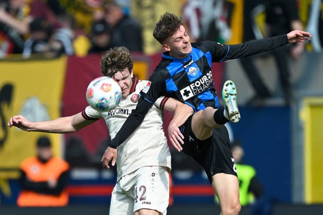 Paderborn, Home Deluxe Arena, 21.03.26, GER, Herren, 2.Bundesliga, Saison 2025-2026, SC Paderborn 07 - Dynamo Dresden Bild: v.li. im Zweikampf Friedrich MUELLER (Dresden) und Ruben MUELLER (Paderborn) DFL regulations prohibit any use of photographs as image sequences and or quasi-video. NRW Deutschland