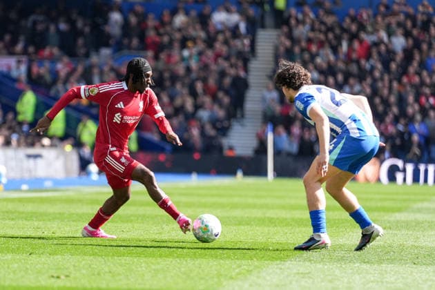 Brighton and Hove Albion v Liverpool, Premier League, Football, Amex Stadium, Brighton, UK - 21 Mar 2026 Jeremie Frimpong of Liverpool and Ferdi Kadioglu of Brighton Brighton Amex Stadium Brighton UK, UK NEWSPAPERS OUT Copyright: xSeanxRyanx