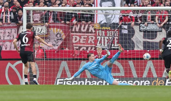 21.03.2026 - Fussball - Saison 2025 2026 - 2. Fussball - Bundesliga - 27. Spieltag: 1. FC Nürnberg FCN ( Club ) - 1. FC Kaiserslautern FCK ( Rote Roten Teufel ) - Sportfoto Zink DaMa - xdaxmax - DFL regulations prohibit any use of photographs as image sequences and or quasi-video - only for editorial use - Tor Treffer Torschuß zum 2:0 - Torschütze Adam Markhiev (6, 1. FC Nürnberg FCN ) per Elfmeter gegen Julian Krahl (1, 1. FC Kaiserslautern FCK )