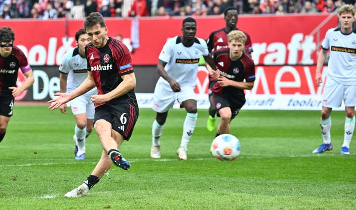 21.03.2026 - Fussball - Saison 2025 2026 - 2. Fussball - Bundesliga - 27. Spieltag: 1. FC Nürnberg FCN ( Club ) - 1. FC Kaiserslautern FCK ( Rote Roten Teufel ) - Sportfoto Zink - xwoxzix - DFL regulations prohibit any use of photographs as image sequences and or quasi-video - only for editorial use - Adam Markhiev (6, 1. FC Nürnberg FCN ) erzielt Treffer Tor Torschuß zum 2:0 per Elfmeter Strafstoß