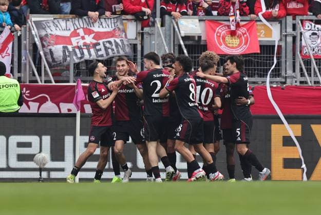 21.03.2026 - Fussball - Saison 2025 2026 - 2. Fussball - Bundesliga - 27. Spieltag: 1. FC Nürnberg FCN ( Club ) - 1. FC Kaiserslautern FCK ( Rote Roten Teufel ) - Sportfoto Zink DaMa - xdaxmax - DFL regulations prohibit any use of photographs as image sequences and or quasi-video - only for editorial use - Jubel Freude Torjubel nach Tor zum 2:0 - Adam Markhiev (6, 1. FC Nürnberg FCN ) und Mannschaft Team jubelt freut sich - Torschütze: Adam Markhiev (6, 1. FC Nürnberg FCN )
