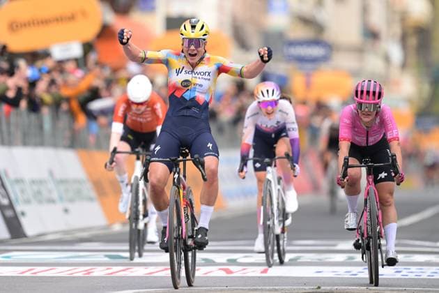 Belgian Lotte Kopecky celebrates as she crosses the finish line to win the Milano-Sanremo one day cycling race for women, 298km from Milan to San Remo, Italy, Saturday 21 March 2026. DAVIDxPINTENS  x168453641x