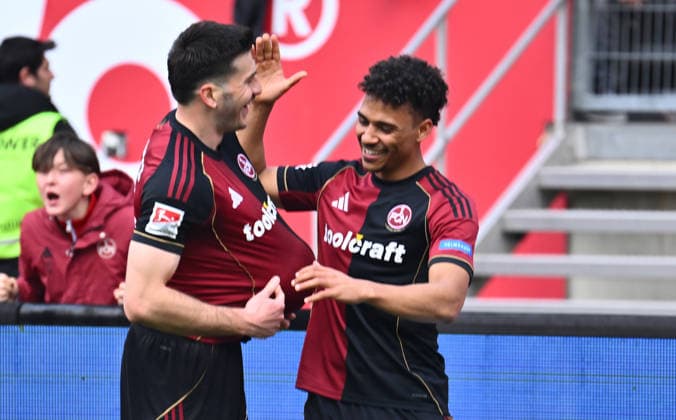 21.03.2026 - Fussball - Saison 2025 2026 - 2. Fussball - Bundesliga - 27. Spieltag: 1. FC Nürnberg FCN ( Club ) - 1. FC Kaiserslautern FCK ( Rote Roten Teufel ) - Sportfoto Zink - xwoxzix - DFL regulations prohibit any use of photographs as image sequences and or quasi-video - only for editorial use - Torjubel Jubel Freude nach Treffer Tor Torschuß zum 3:0 durch Luka Lochoshvili (24, 1. FC Nürnberg FCN ) - Luka Lochoshvili (24, 1. FC Nürnberg FCN ) Henri Koudossou (8, 1. FC Nürnberg FCN )
