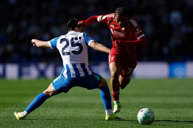 Rio Ngumoha of Liverpool is challenged by Diego Gomez of Brighton and Hove Albion Brighton and Hove Albion v Liverpool, Premier League, Football, American Express Community Stadium, Brighton, UK - 21 Mar 2026Brighton American Express Community Stadi United Kingdom EDITORIAL USE ONLY No use with unauthorised audio, video, data, fixture lists, club league logos or live services. Online in-match use limited to 120 images, no video emulation. No use in betting, games or single club league player publications. Copyright: xWillxCooper Shutterstockx 16783233al