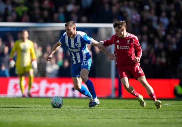 Brighton and Hove Albion v Liverpool, Premier League, Football, Amex Stadium, Brighton, UK - 21 Mar 2026 James Milner of Brighton and Florian Wirtz of Liverpool Brighton Amex Stadium Brighton UK, UK NEWSPAPERS OUT Copyright: xSeanxRyanx