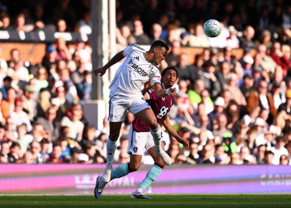 21st March 2026; Craven Cottage, Fulham, London, England; Premier League Football, Fulham versus Burnley; Rodrigo Muniz of Fulham heads the ball over Bashir Humphreys of Burnley  JPxFletcher Content restricted for UK based newspaper