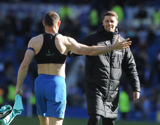 Football - 2025 2026 Premier League - Brighton & Hove Albion vs. Liverpool - the Amex (Falmer Stadium) - Saturday 21st March 2026 Brighton Manager, Fabian Hurzeler celebrates with James Milner after the match 