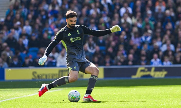 Giorgi Mamarsdashvili of Liverpool clears the ball during the Premier League match between Brighton and Hove Albion and Liverpool at the American Express Stadium , Brighton , UK - 21st March 2026 Brighton & Hove Albion vs Liverpool Premier League Football, Amex Stadium, Sussex, United Kingdom - 21 Mar 2026Brighton Amex Stadium Sussex United Kingdom Editorial use only. No merchandising. For Football images FA and Premier League restrictions apply inc. no internet mobile usage without FAPL license - for details contact Football Dataco  Copyright: xSimonxDack TPI Shutterstockx 16784403am