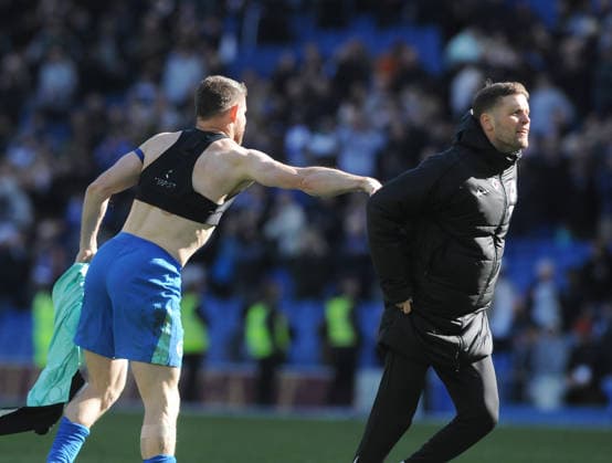Football - 2025 2026 Premier League - Brighton & Hove Albion vs. Liverpool - the Amex (Falmer Stadium) - Saturday 21st March 2026 Brighton Manager, Fabian Hurzeler celebrates with James Milner after the match 