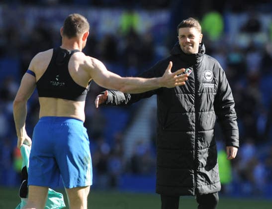 Football - 2025 2026 Premier League - Brighton & Hove Albion vs. Liverpool - the Amex (Falmer Stadium) - Saturday 21st March 2026 Brighton Manager, Fabian Hurzeler celebrates with James Milner after the match 