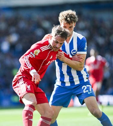 Alexis Mac Allister of Liverpool battles with Mats Wieffer of Brighton during the Premier League match between Brighton and Hove Albion and Liverpool at the American Express Stadium , Brighton , UK - 21st March 2026 Brighton & Hove Albion vs Liverpool Premier League Football, Amex Stadium, Sussex, United Kingdom - 21 Mar 2026Brighton Amex Stadium Sussex United Kingdom Editorial use only. No merchandising. For Football images FA and Premier League restrictions apply inc. no internet mobile usage without FAPL license - for details contact Football Dataco  Copyright: xSimonxDack TPI Shutterstockx 16784403ap