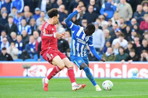 Brighton and Hove Albion v Liverpool, Premier League Curtis Jones Midfielder of Liverpool and Yankuba Minteh Forward of Brighton and Hove Albion in action during the Premier League match between Brighton and Hove Albion and Liverpool at the American Express Stadium, Brighton and Hove, UK on 21 March 2026. Brighton and Hove American Express Stadium East Sussex UK Editorial use only DataCo restrictions apply See www.football-dataco.com , Copyright: xJeffxMoodx PSI-23949-0031