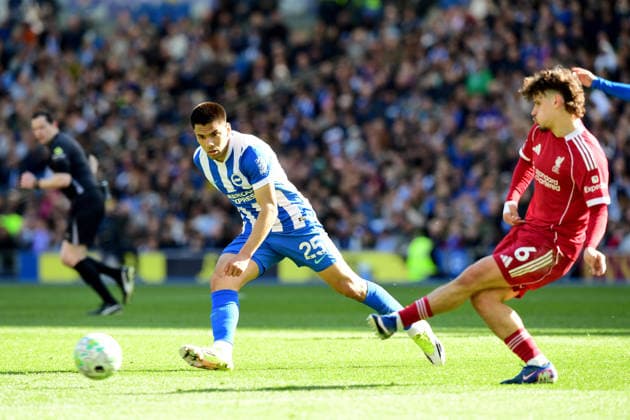 Brighton and Hove Albion v Liverpool, Premier League Milos Kerkez Defender of Liverpool plays the ball under pressure from Diego Gomez Midfielder of Brighton and Hove Albion during the Premier League match between Brighton and Hove Albion and Liverpool at the American Express Stadium, Brighton and Hove, UK on 21 March 2026. Brighton and Hove American Express Stadium East Sussex UK Editorial use only DataCo restrictions apply See www.football-dataco.com , Copyright: xJeffxMoodx PSI-23949-0033