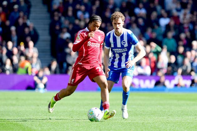 Brighton and Hove Albion v Liverpool, Premier League Rio Ngumoha Forward of Liverpool controls the ball under pressure from Matts Wieffer Midfielder of Brighton and Hove Albion during the Premier League match between Brighton and Hove Albion and Liverpool at the American Express Stadium, Brighton and Hove, UK on 21 March 2026. Brighton and Hove American Express Stadium East Sussex UK Editorial use only DataCo restrictions apply See www.football-dataco.com , Copyright: xJeffxMoodx PSI-23949-0034