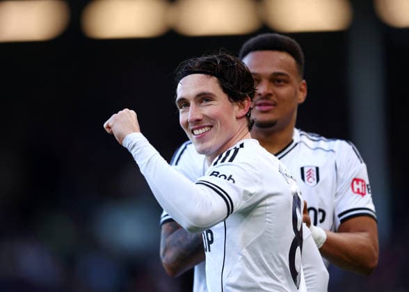 21st March 2026; Craven Cottage, Fulham, London, England; Premier League Football, Fulham versus Burnley; Harry Wilson of Fulham celebrates with Rodrigo Muniz of Fulham after scoring his sides 2nd goal in the 73rd minute to make it 2-1  JPxFletcher Content restricted for UK based newspaper