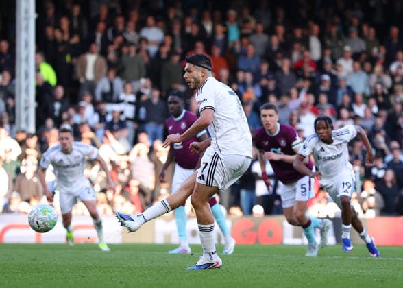 21st March 2026; Craven Cottage, Fulham, London, England; Premier League Football, Fulham versus Burnley; Raul Jimenez of Fulham scoring his sides 3rd goal from a penalty in the 95th minute to make it 3-1  JPxFletcher Content restricted for UK based newspaper