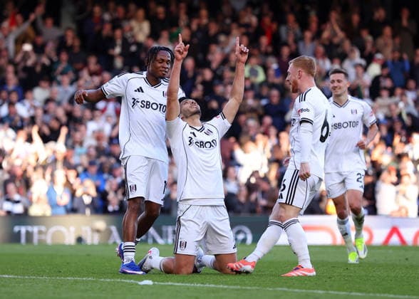 21st March 2026; Craven Cottage, Fulham, London, England; Premier League Football, Fulham versus Burnley; Raul Jimenez of Fulham celebrates with his team mates after scoring his sides 3rd goal from a penalty in the 95th minute to make it 3-1  JPxFletcher
