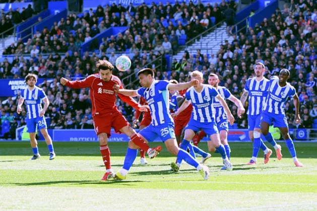 Brighton and Hove Albion v Liverpool, Premier League Curtis Jones Midfielder of Liverpool and Diego Gomez Midfielder of Brighton and Hove Albion in action during the Premier League match between Brighton and Hove Albion and Liverpool at the American Express Stadium, Brighton and Hove, UK on 21 March 2026. Brighton and Hove American Express Stadium East Sussex UK Editorial use only DataCo restrictions apply See www.football-dataco.com , Copyright: xJeffxMoodx PSI-23949-0052