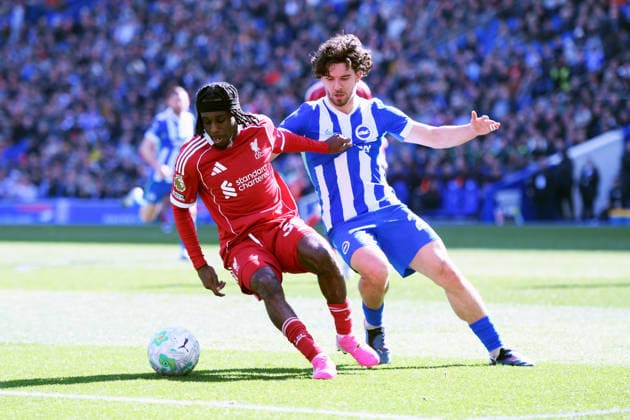 Brighton and Hove Albion v Liverpool, Premier League Jeremie Frimpong Defender of Liverpool and Ferdi KadÄ±oÄülu Defender of Brighton and Hove Albion jostles for the ball during the Premier League match between Brighton and Hove Albion and Liverpool at the American Express Stadium, Brighton and Hove, UK on 21 March 2026. Brighton and Hove American Express Stadium East Sussex UK Editorial use only DataCo restrictions apply See www.football-dataco.com , Copyright: xJeffxMoodx PSI-23949-0056