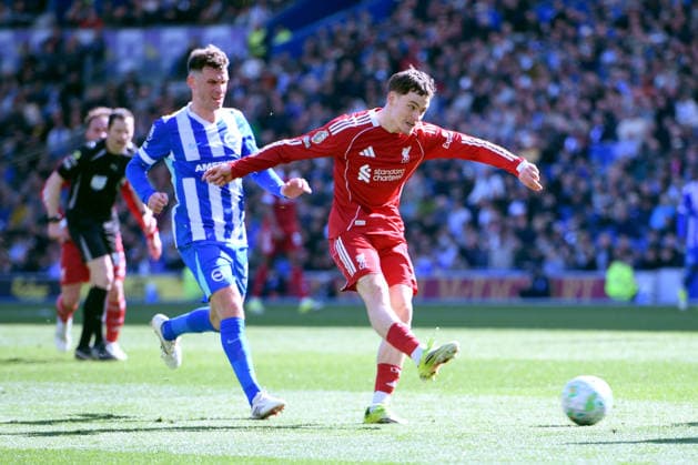 Brighton and Hove Albion v Liverpool, Premier League Florian Wirtz Midfielder of Liverpool has a strike on goal during the Premier League match between Brighton and Hove Albion and Liverpool at the American Express Stadium, Brighton and Hove, UK on 21 March 2026. Brighton and Hove American Express Stadium East Sussex UK Editorial use only DataCo restrictions apply See www.football-dataco.com , Copyright: xJeffxMoodx PSI-23949-0060
