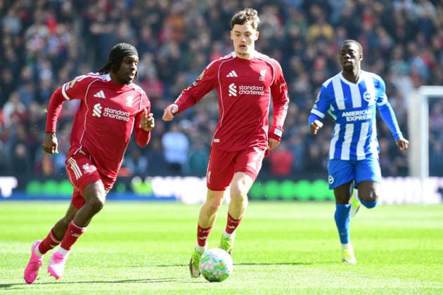 Brighton and Hove Albion v Liverpool, Premier League Jeremie Frimpong Defender of Liverpool, Florian Wirtz Midfielder of Liverpool and Yankuba Minteh Forward of Brighton and Hove Albion all in action during the Premier League match between Brighton and Hove Albion and Liverpool at the American Express Stadium, Brighton and Hove, UK on 21 March 2026. Brighton and Hove American Express Stadium East Sussex UK Editorial use only DataCo restrictions apply See www.football-dataco.com , Copyright: xJeffxMoodx PSI-23949-0063