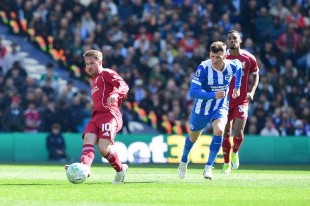 Brighton and Hove Albion v Liverpool, Premier League Alexis Mac Allister Midfielder of Liverpool plays a through ball during the Premier League match between Brighton and Hove Albion and Liverpool at the American Express Stadium, Brighton and Hove, UK on 21 March 2026. Brighton and Hove American Express Stadium East Sussex UK Editorial use only DataCo restrictions apply See www.football-dataco.com , Copyright: xJeffxMoodx PSI-23949-0068