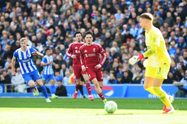 Brighton and Hove Albion v Liverpool, Premier League Florian Wirtz Midfielder of Liverpool makes a run towards Bart Verbruggen Goalkeeper of Brighton and Hove Albion during the Premier League match between Brighton and Hove Albion and Liverpool at the American Express Stadium, Brighton and Hove, UK on 21 March 2026. Brighton and Hove American Express Stadium East Sussex UK Editorial use only DataCo restrictions apply See www.football-dataco.com , Copyright: xJeffxMoodx PSI-23949-0072