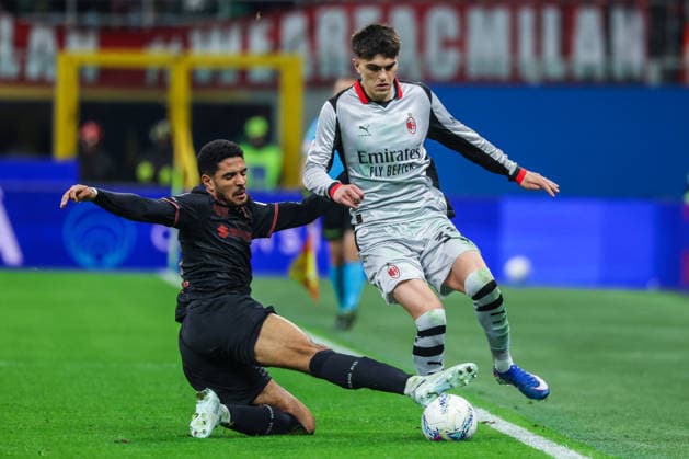 AC Milan vs Torino FC - Serie A 2025 26 - 21 03 2026 Davide Bartesaghi of AC Milan competes for the ball with Saul Coco of Torino FC during Serie A 2025 26 football match between AC Milan and Torino FC at San Siro Stadium in Milan Copyright: xBEAUTIFULxSPORTS Carabellix