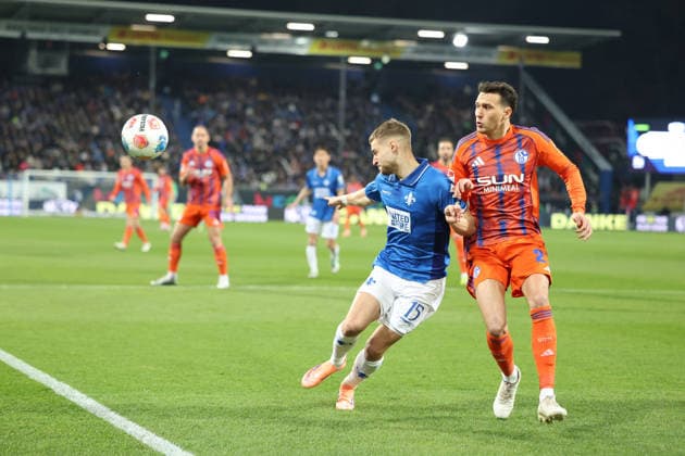 21.03.2026, xrekx, Fussball 2.Bundesliga, SV Darmstadt 98 - FC Schalke 04 v.l. Fabian Nürnberger Nuernberger (SV Darmstadt 98) Dejan Ljubicic (FC Schalke 04) Zweikampf, Aktion, action, battle for the ball (DFL DFB REGULATIONS PROHIBIT ANY USE OF PHOTOGRAPHS as IMAGE SEQUENCES and or QUASI-VIDEO) Darmstadt
