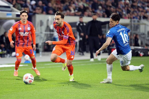 21.03.2026, xrekx, Fussball 2.Bundesliga, SV Darmstadt 98 - FC Schalke 04 v.l. Kenan Karaman (FC Schalke 04) Hiroki Akiyama (SV Darmstadt 98) (DFL DFB REGULATIONS PROHIBIT ANY USE OF PHOTOGRAPHS as IMAGE SEQUENCES and or QUASI-VIDEO) Darmstadt